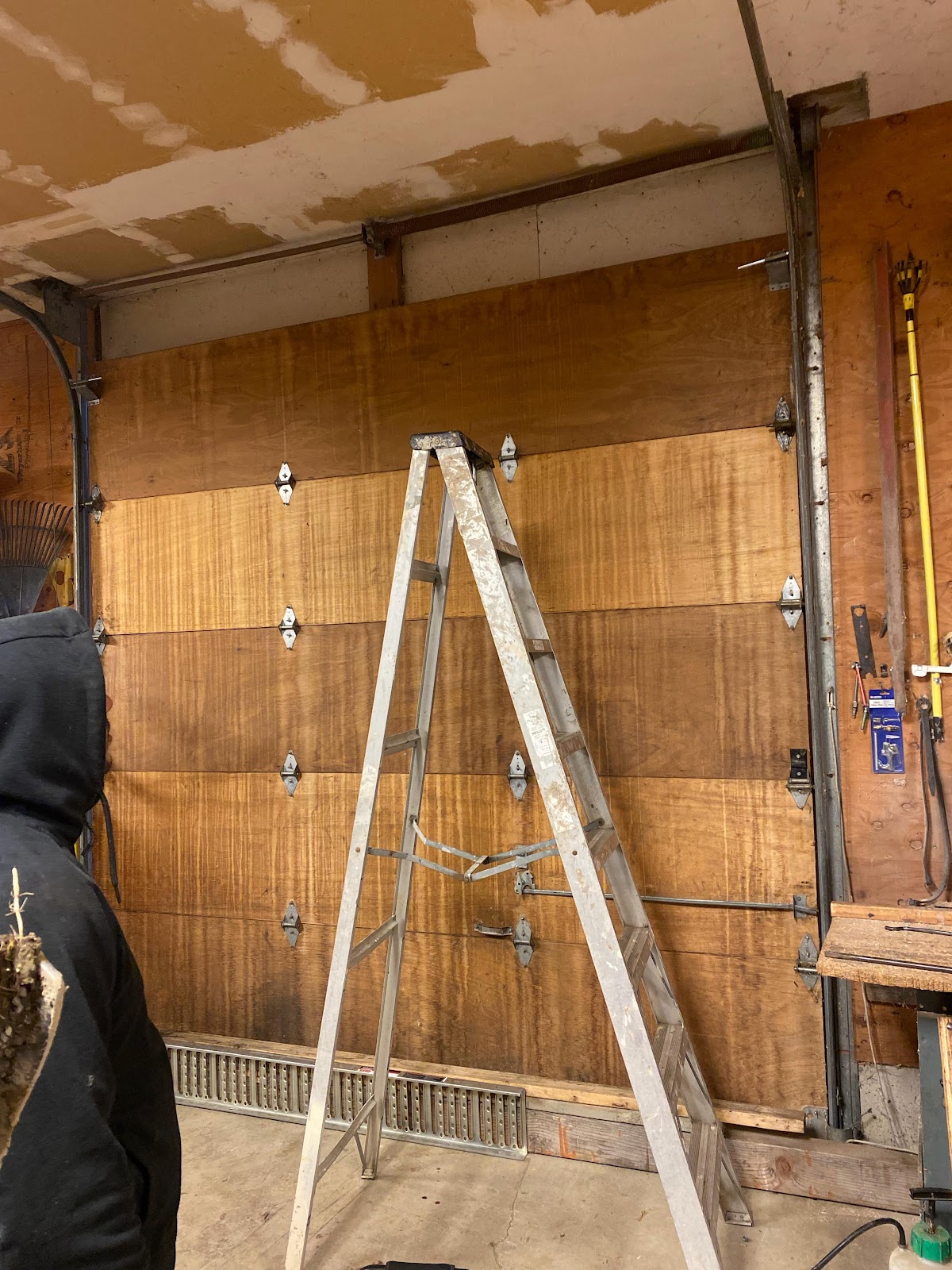 Garage door repair in progress